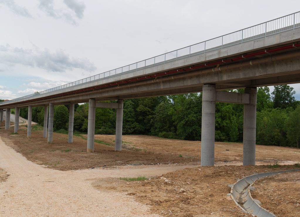 Concrete bridge construction with pillars and framework